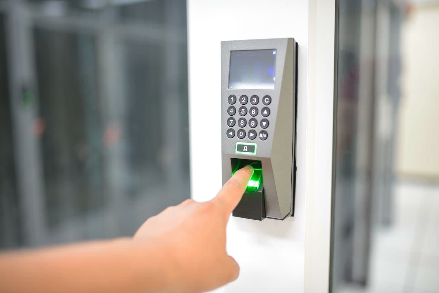 A finger on a biometric fingerprint reader