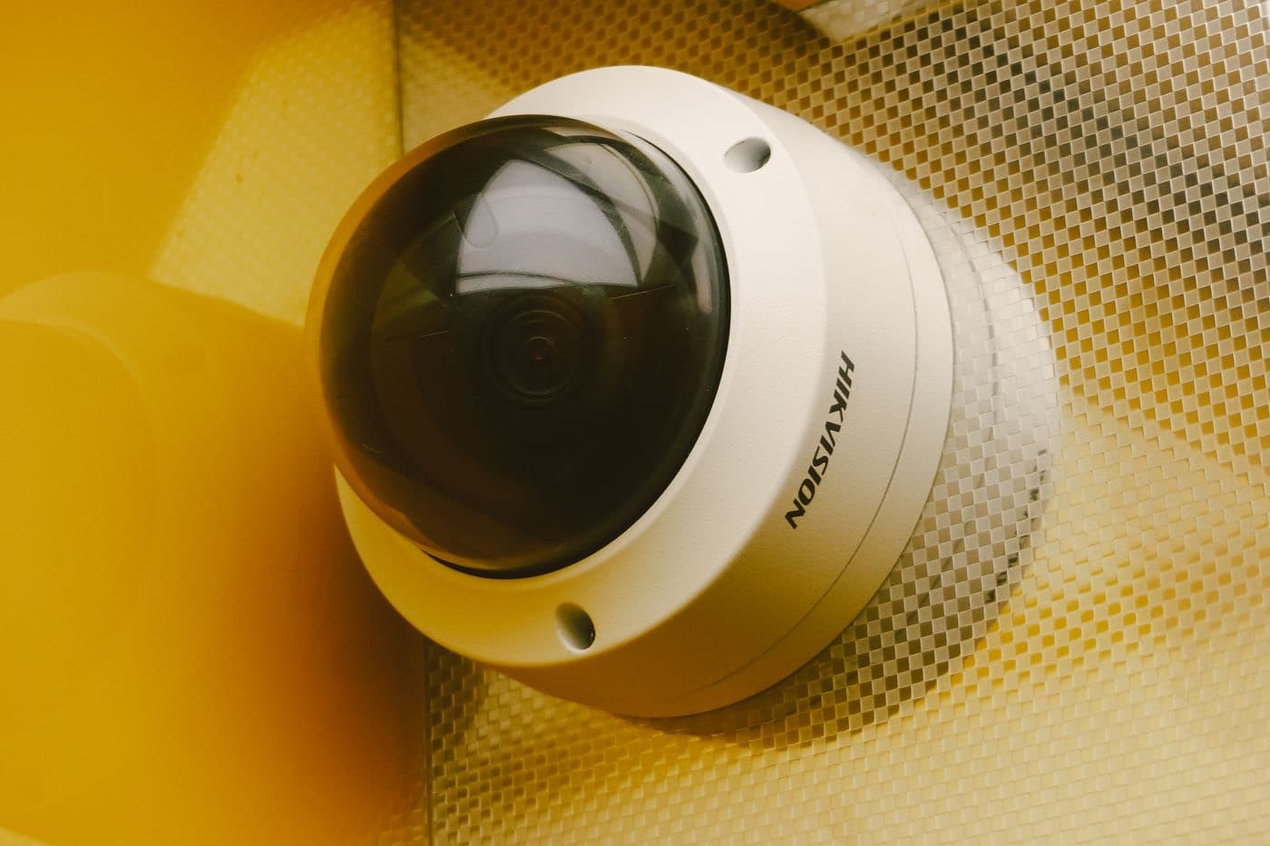 A dome camera mounted on a wall